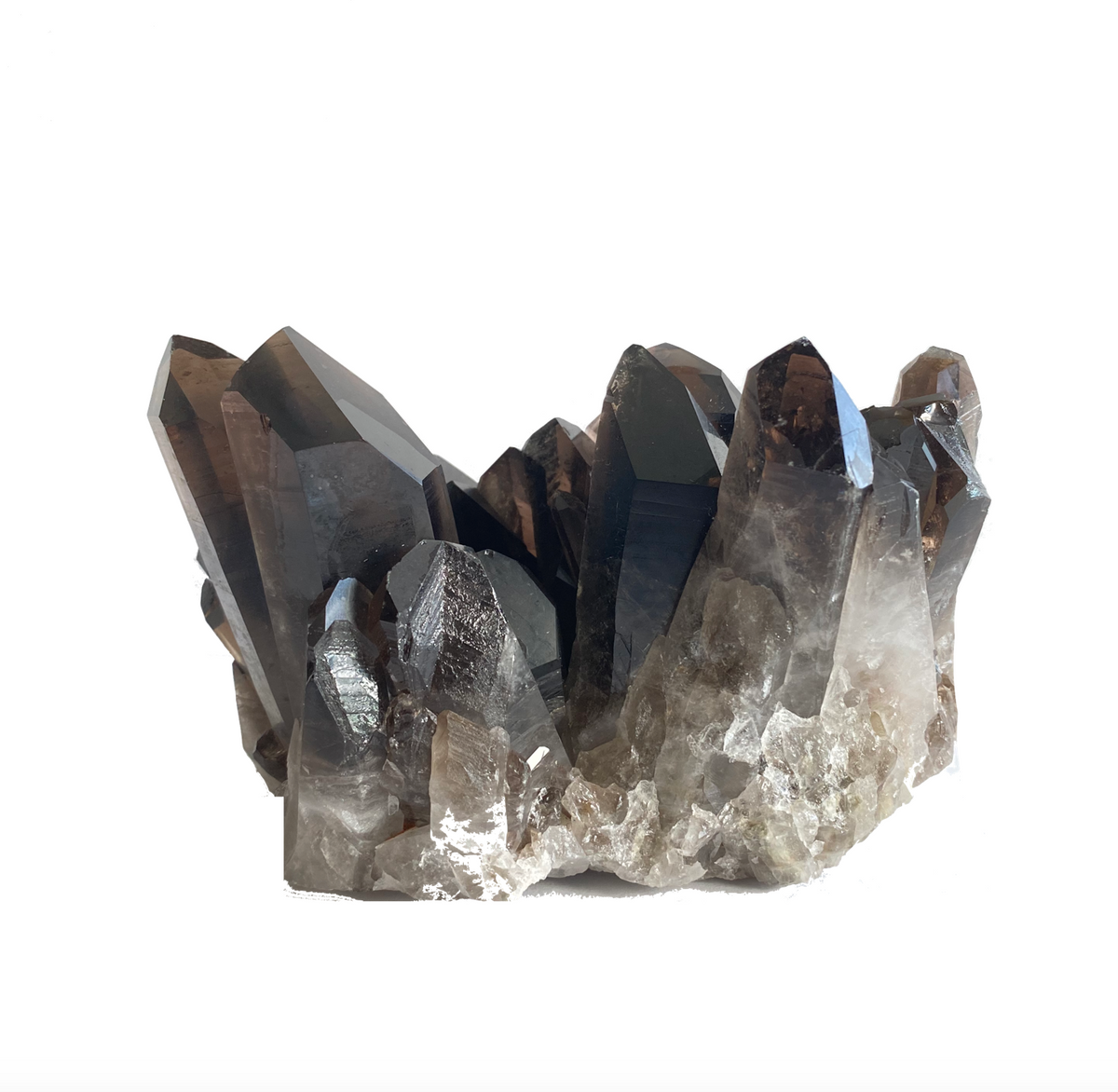 A cluster of dark smoky quartz crystals with a smoky appearance against a white background - JOY - Journey Of You - Spiritual, Holistic, Empowering