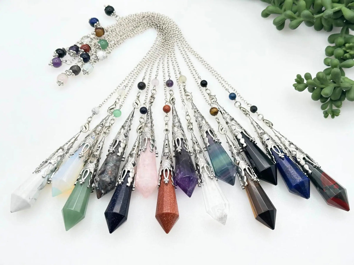 Necklace with multicolored crystal pendants on a white background