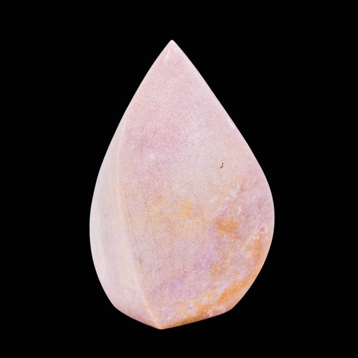 Teardrop-shaped stone on a black background