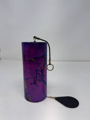 Purple cylindrical product with a black handle on a white background - JOY - Journey Of You - Spiritual, Holistic, Empowering