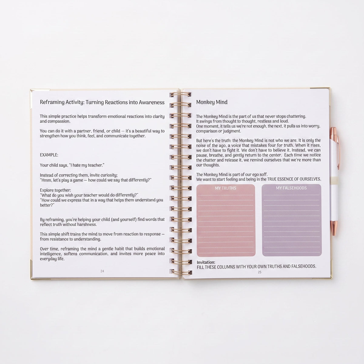 An open spiral-bound journal or notebook spread showing printed pages with text and a purple color sample block, photographed on a clean white background.