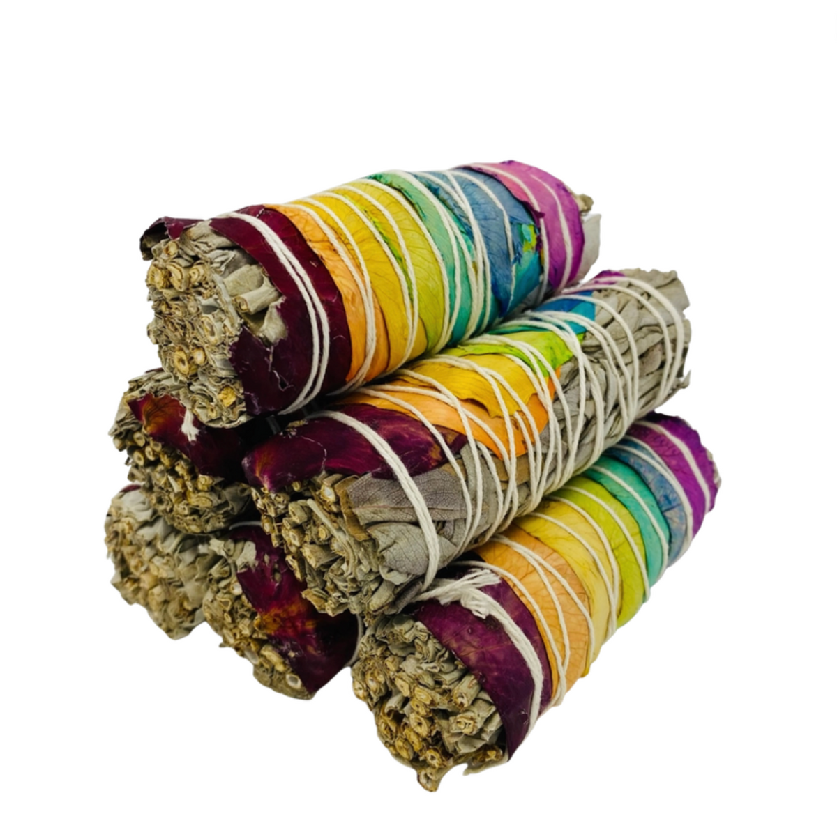 A collection of multicolored sage smudge sticks tied with string, arranged vertically.
