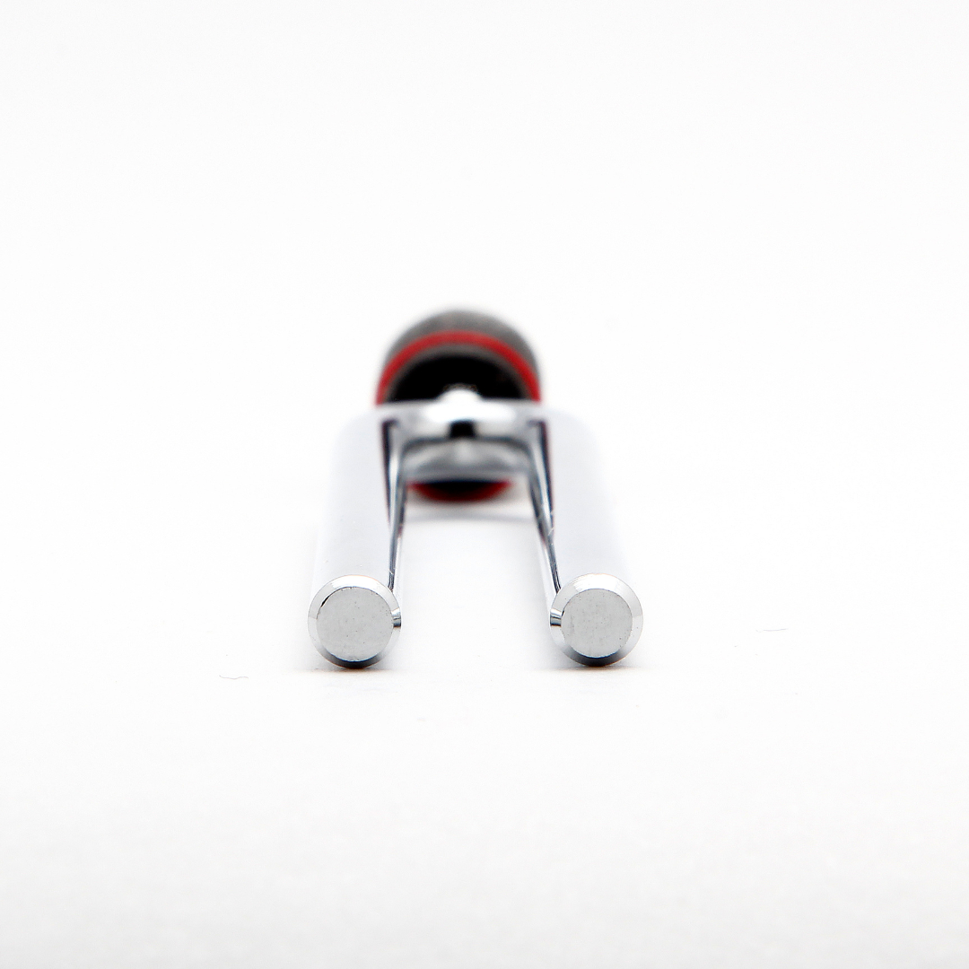 Chrome hook with red accent on a white background