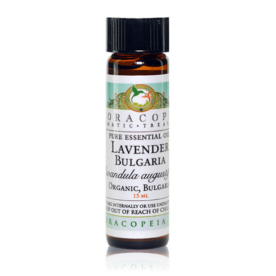 A bottle of Organopeia Lavender Bulgaria Essential Oil with a label showing an image of lavender flowers and the scent mark -JOY - Journey Of You - Spiritual, Holistic, Empowering